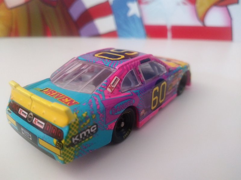 The “RFR DRIVEN” logos are completely made up for the diecast. These never appeared. But why sell a diecast with blank space on it where you could plug your team instead?